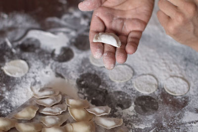 High angle view of person preparing food