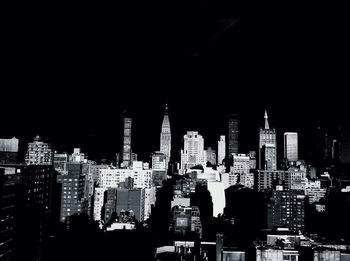 Illuminated cityscape at night
