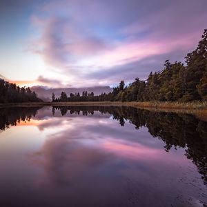 Reflection of clouds in lake during sunset
