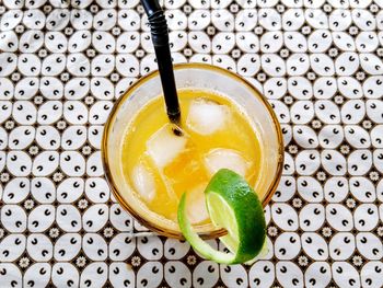 High angle view of orange juice on table