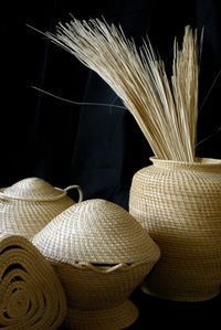 Close-up of hat against black background