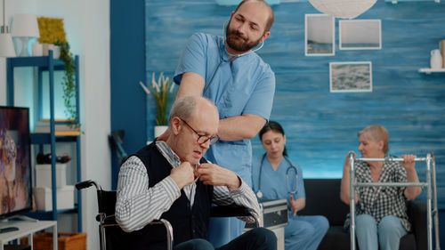 Doctor examining patient at hospital