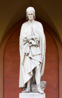 Low angle view of statue against building