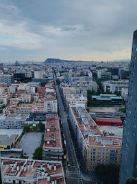 High angle view of buildings in city against sky