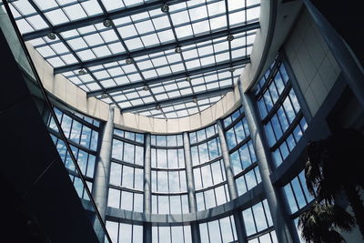 Low angle view of glass ceiling