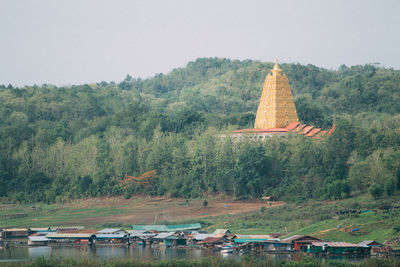 View of temple on building against sky