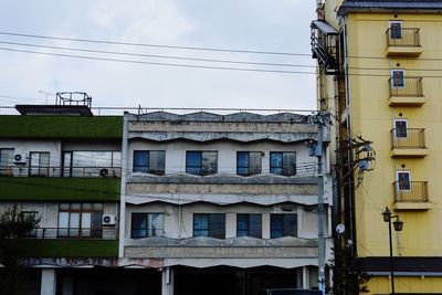 Low angle view of residential buildings against sky