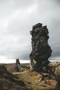 Rock formations on land against sky