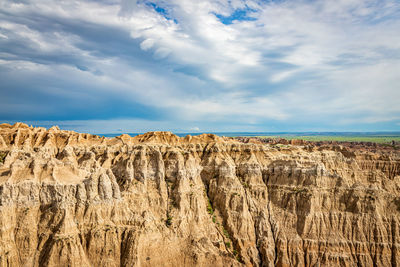 Scenic view of land against sky