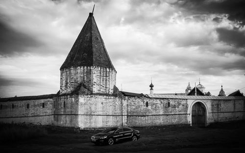 Built structure against cloudy sky