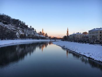 River in city during winter