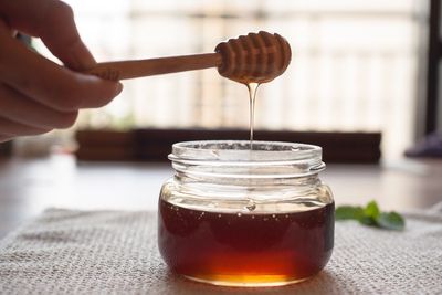 Close-up of honey in jar