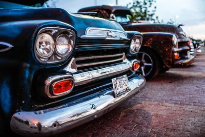 Close-up of vintage car on street