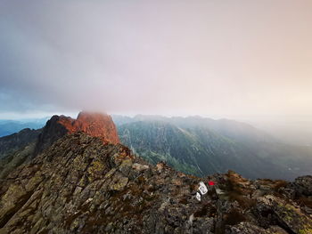Cloudy mountain peaks at sunrise. tatry poland, rysy on the right.