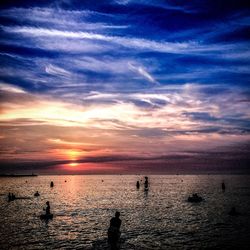 Scenic view of sea at sunset