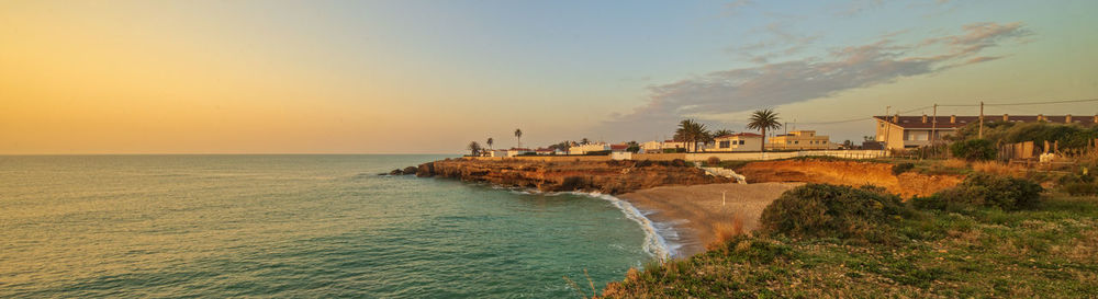 Scenic view of sea against sky during sunset