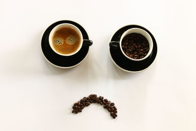 High angle view of coffee cup on table