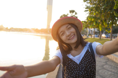 Portrait of smiling young woman