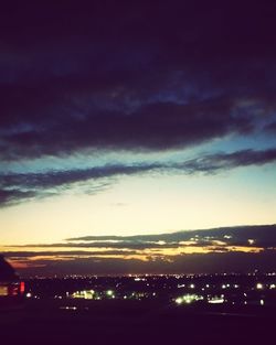 Dramatic sky over city at night