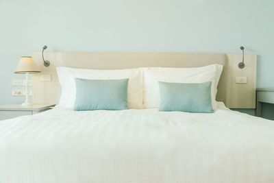 Pillows on bed in bedroom