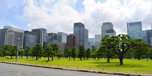 Panoramic view of city buildings against sky