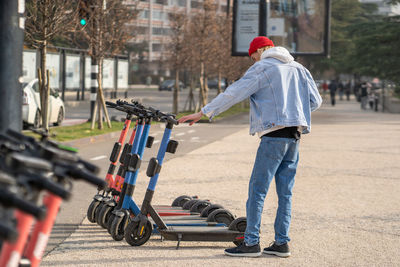 Rear view of man standing on street