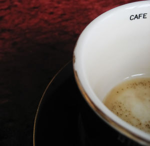 Close-up of coffee cup on table