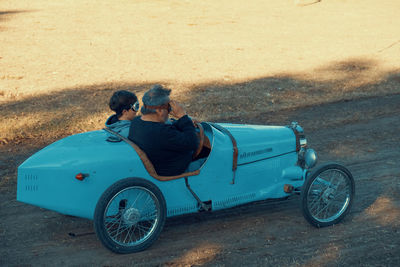 Father and son driving a cyclekart