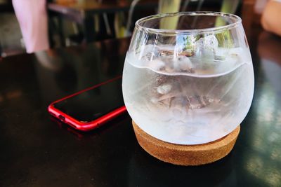 Close-up of beer glass on table