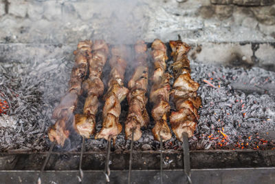 Close-up of meat on barbecue grill