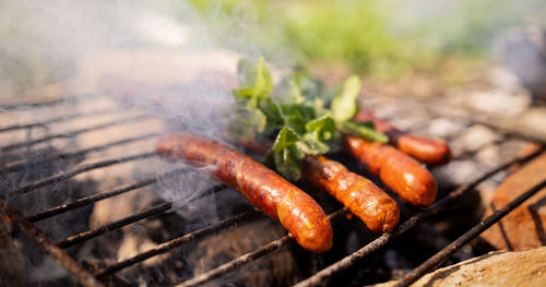 Close-up of meat on barbecue grill