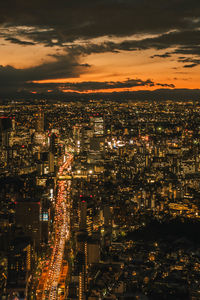 High angle view of illuminated city at night