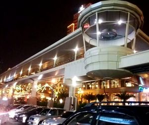 Low angle view of illuminated building at night