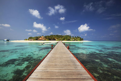 Scenic view of pier on sea