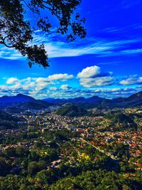 Scenic view of mountains against cloudy sky