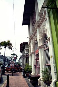 Street in city against sky