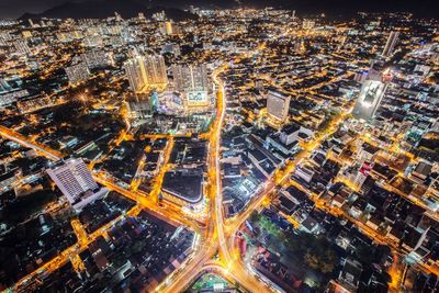 High angle view of illuminated cityscape at night