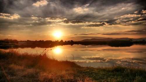 Scenic view of landscape against sky during sunset