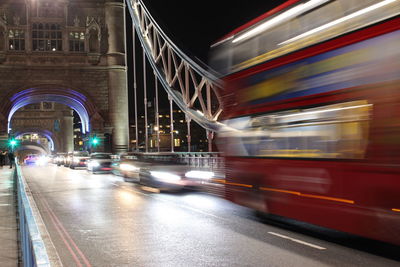 High angle view of light trails on road at night