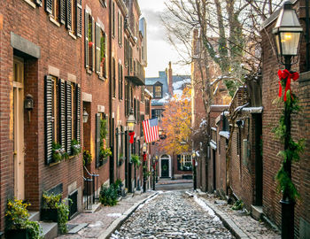 Narrow alley amidst buildings in city