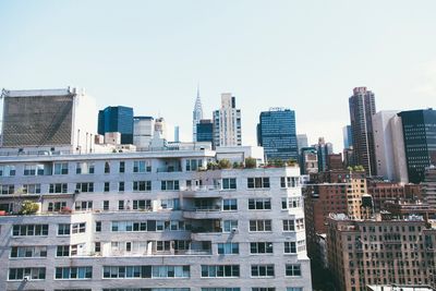 Modern cityscape against sky