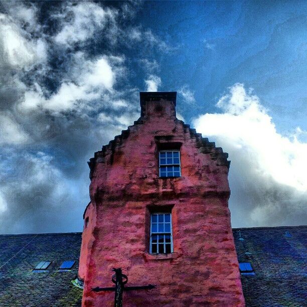 architecture, built structure, building exterior, sky, cloud - sky, house, window, cloudy, low angle view, cloud, residential structure, old, wall - building feature, day, outdoors, brick wall, weathered, no people, building, residential building