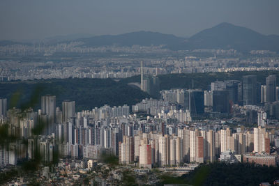 High angle view of cityscape against sky during sunset