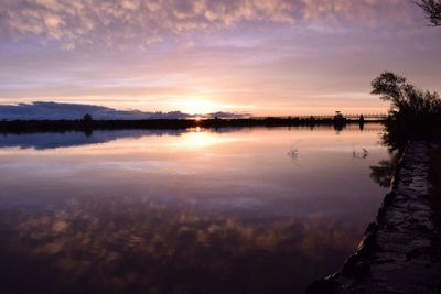 Scenic view of sea against sky at sunset