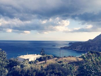 Scenic view of sea against cloudy sky