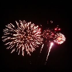 Low angle view of firework display