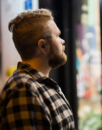 Side view of man looking away