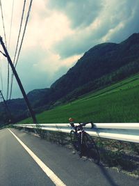 Country road leading towards mountains