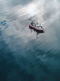 High angle view of boat sailing in sea