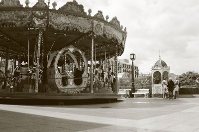Built structure against cloudy sky